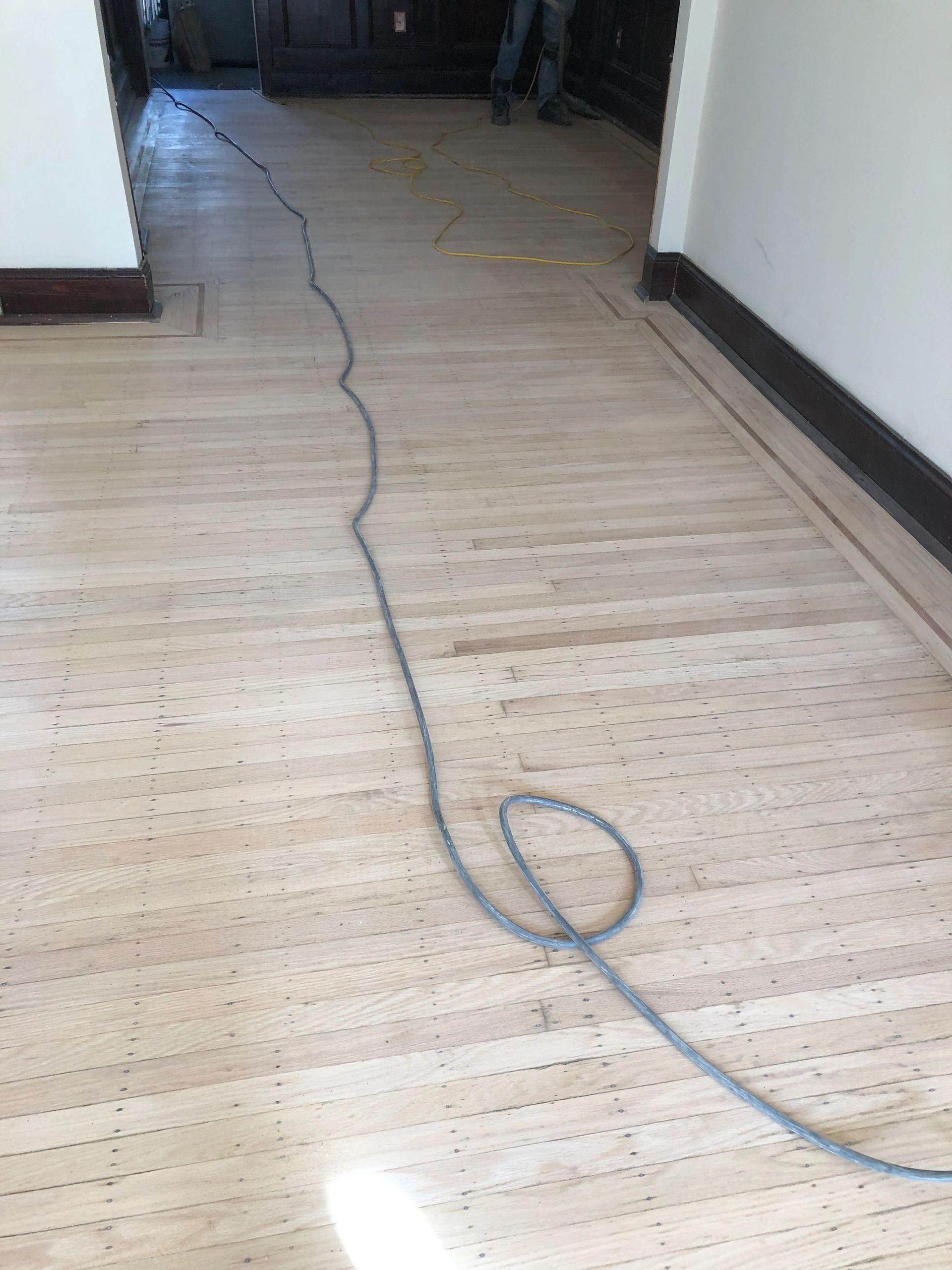 Residential hardwood floor installation in living room